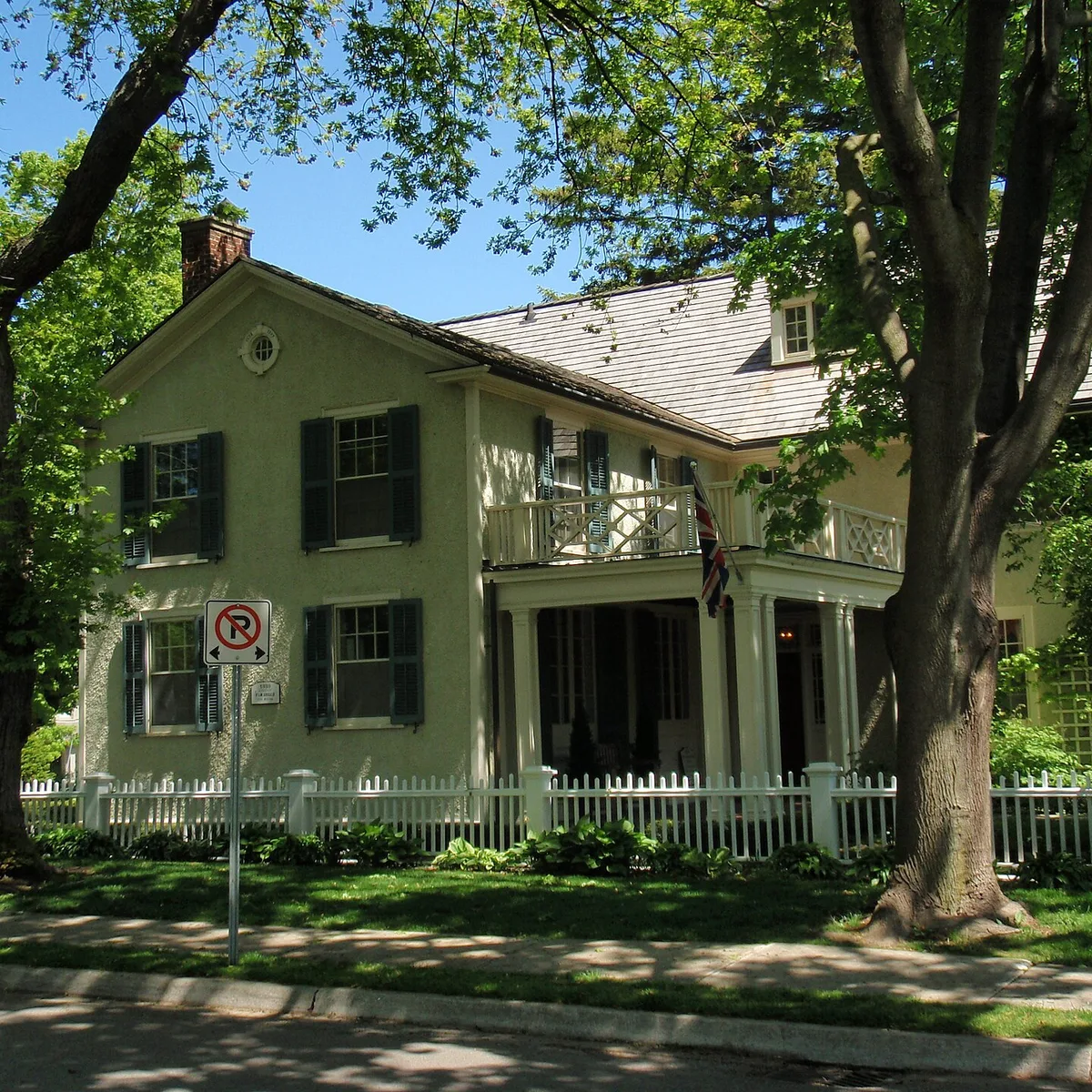 Established detached home surrounded by mature trees in Oakville