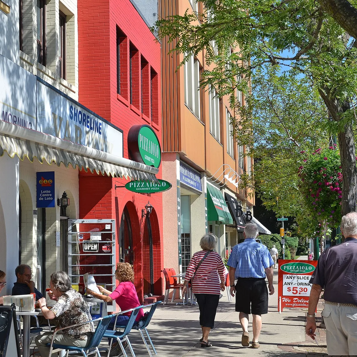 Shops, restaurants and pedestrians along Lakeshore Road East in Downtown Oakville